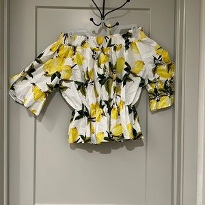 Off the should lemon top.